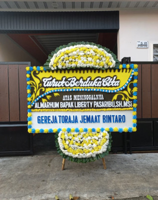 Papan Bunga Duka di Caringinnunggal